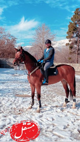 اسب سواری آقای خواننده در برف + عکس